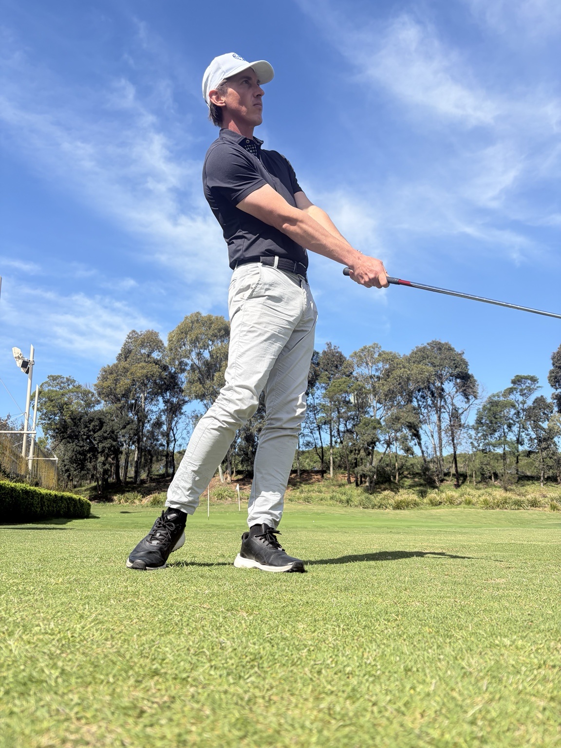 Matthew Davis following through on a chip shot in Heatherton